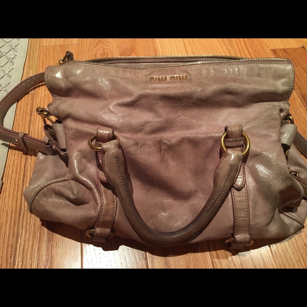 Worn, light purple/pink Vitello bow Miu Miu bag